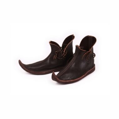 Pair of handmade dark brown medieval pointed Schnabelschuhe with laced folded collars on white background