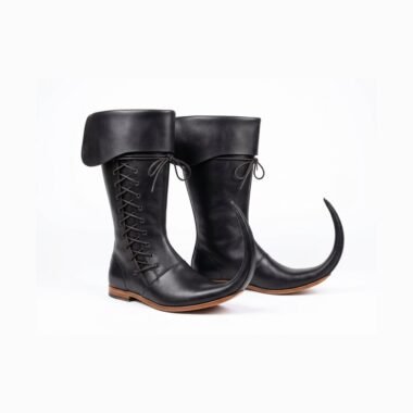 Pair of black medieval Schnabelstiefel with fold-over cuff, crossed leather laces and long curved pointed toes on white background